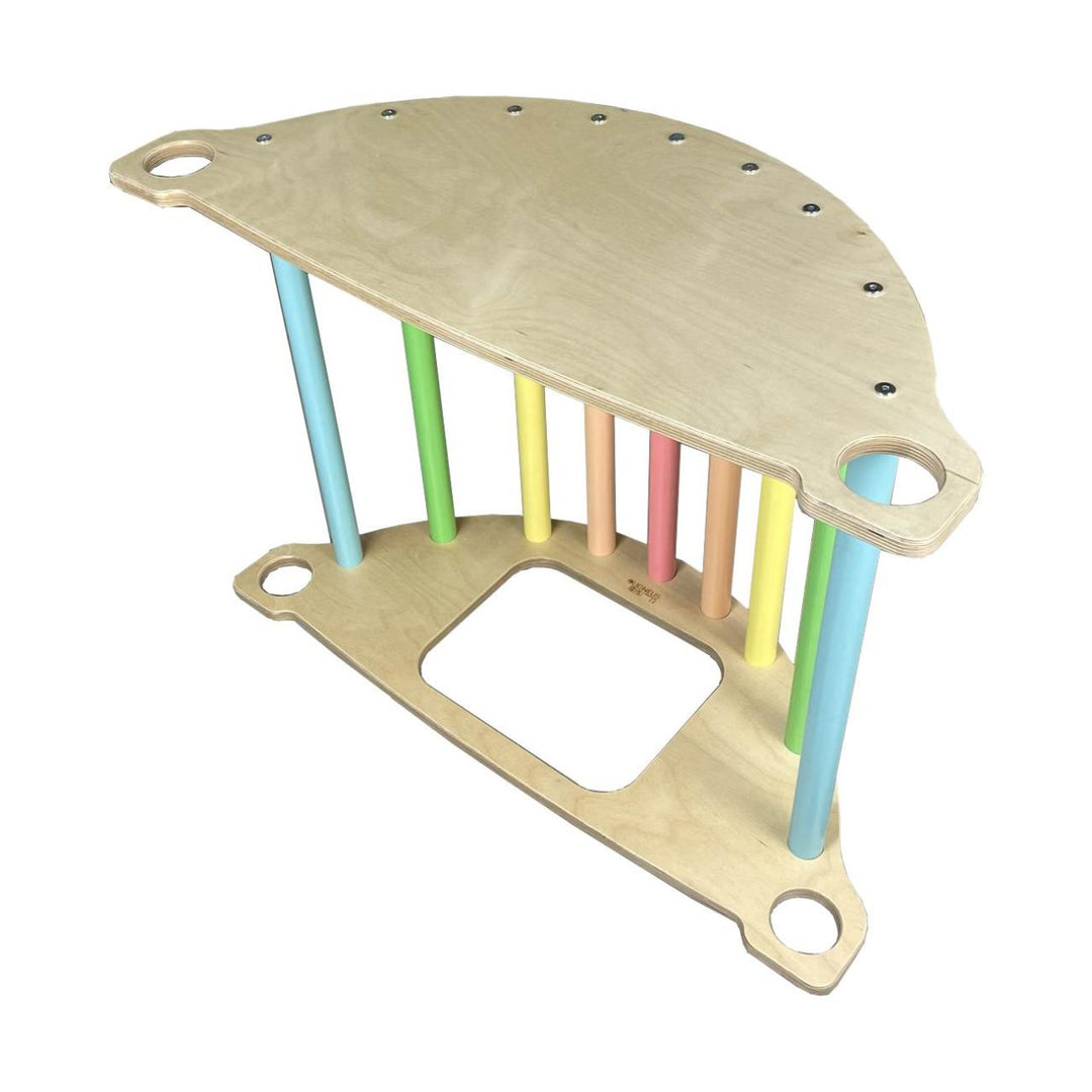 Pikler nursery size rocker arch and sensory table in pastel rainbow finish